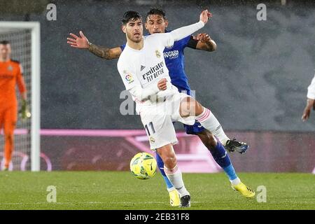 Marco Asensio (l) del Real Madrid e Damian Suarez di Getafe CF durante la Liga match Real Madrid contro Getafe il 9 febbraio 2021 a Madrid, Spagna. Foto di Acero/AlterPhotos/ABACAPRESS.COM Foto Stock