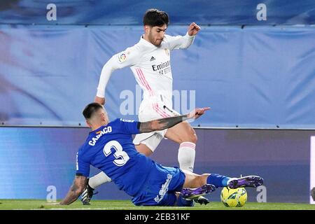 Marco Asensio (r) del Real Madrid e Erick Cabaco di Getafe CF durante la Liga match Real Madrid contro Getafe il 9 febbraio 2021 a Madrid, Spagna. Foto di Acero/AlterPhotos/ABACAPRESS.COM Foto Stock