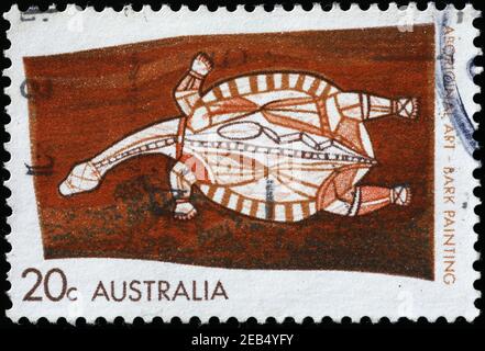 Abbaio aborigeno pittura di una tartaruga su francobollo australiano Foto Stock