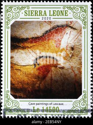 Cavalli in dipinti grotta di Lascaux su francobollo Foto Stock