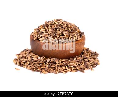 Latte semi di Thistle in ciotola di legno, isolato su sfondo bianco. Silybum marianum, Scotch Thistle o Marian Thistle. Foto Stock