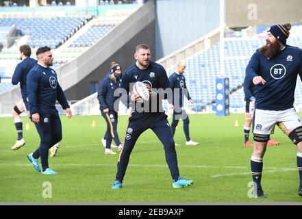 BT Murrayfield Stadium, Edinburgh.Scotland UK.12th Feb 21. Scotland Rugby Squad Training session for the Guinness Six Nations match vs Wales Pic Shows Scotland Finn Russell (Racing 92) & Gary Graham (Newcastle Falcons) (R) Credit: eric mcowat/Alamy Live News Foto Stock