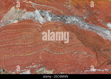 Red jasper dal Sud Africa per uso in background Foto Stock