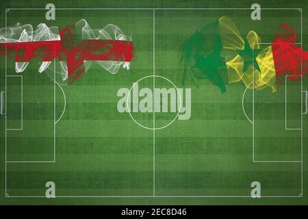 Inghilterra vs Senegal Soccer Match, colori nazionali, bandiere nazionali, campo di calcio, gioco di calcio, concetto di competizione, Copia spazio Foto Stock