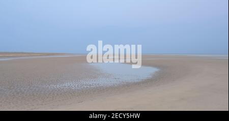 L'ampio orizzonte della spiaggia di Holme. Foto Stock