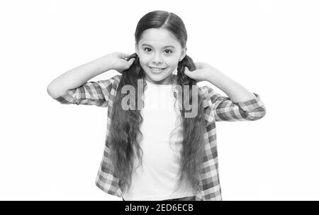 Come crescere i capelli più velocemente. Ragazza bambino molto lungo capelli. Parrucchiere. Mantenere l'igiene corretta e la cura di sé. Tagliare via alle estremità morte può contribuire a ringiovanire. Capelli che crescono la vita hack. Foto Stock