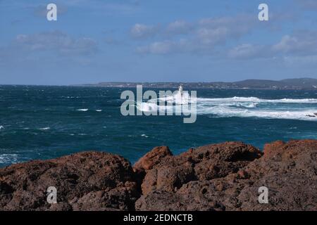 Faro mangiabarca, famoso faro di Calasetta, Sant Antioco, Sardegna, Italia Foto Stock