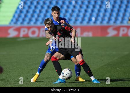 Adnan Januzaj di Real Sociedad e Mathias Olivera di Getafe Durante il campionato spagnolo la Liga partita di calcio tra Getafe CF AN / LM Foto Stock