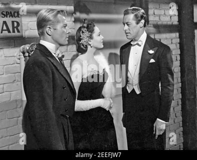 UNFAITHFULLY IL TUO 1948 ventesimo film Century-Fox con da sinistra: Kurt Kreuger, Linda Darnell, Rex Harrison Foto Stock