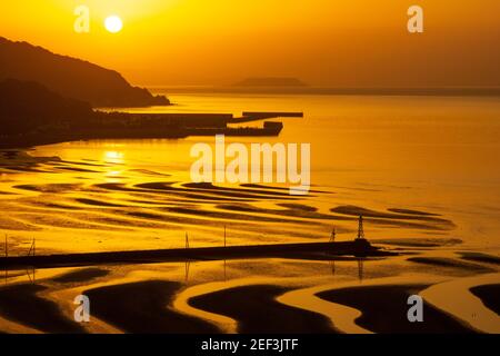 Okoshiki spiaggia di tramonto, Prefettura di Kumamoto, Giappone Foto Stock