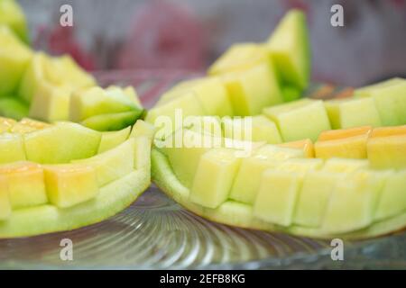 Vicino al Green Cantaloupe è stato fatto scorrere su capsula di vetro Foto Stock