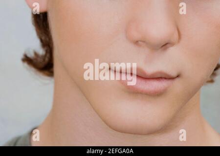 Close-up di un ragazzo adolescente Foto Stock