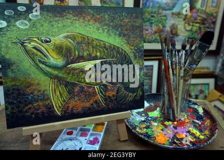 Disegno a mano, Arte, pittura, colore dell'olio, Auspicious, pesce di Arowana, Lucky, terra tailandese Foto Stock