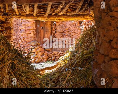 Granaio a Megdaz, un tradizionale villaggio berbero nella regione di M'Goun delle montagne dell'Atlante del Marocco Foto Stock