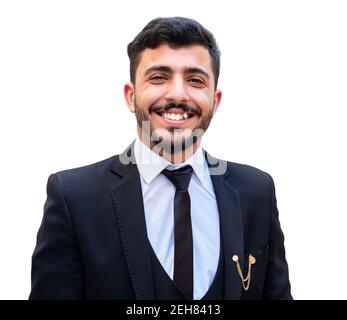 Giovane ragazzo allegro che indossa il tuxedo con alta sicurezza e pronto per il prossimo Foto Stock