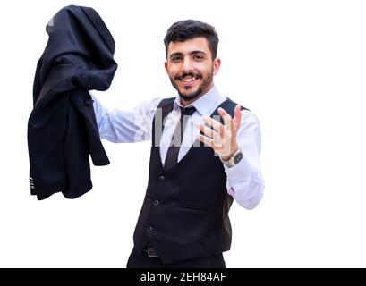 Uomo d'affari allegro ed eccitato in un background isolato che celebra il suo realizzazioni tenendo la sua giacca tuta e sollevando il suo pugno di mostrare il suo Foto Stock