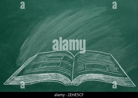 Disegno del libro aperto sulla lavagna Foto Stock