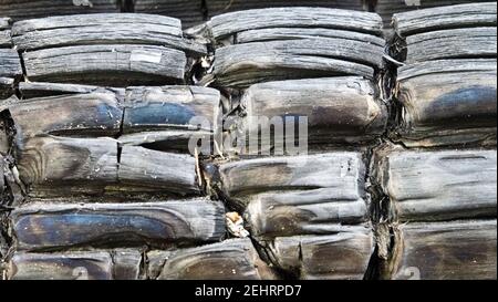 Sfondo legno bruciato (non distrutto), bruciato sul log di superficie, carbone Foto Stock