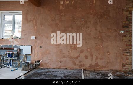 Intonacatura delle pareti, fondo marrone liscio Foto Stock