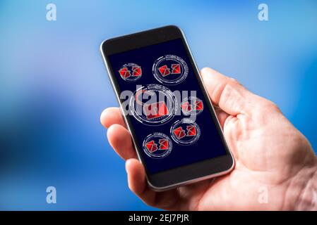 Lo schermo dello smartphone visualizza un concetto di spam Foto Stock