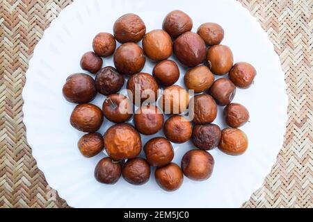 Frutto di jujube indiano, coltivato nella giungla o nella giungla in India, Pakistan, bangladesh Asiatico. Closeup di India frutta colore marrone marrone marrone marrone marrone arancio. Foto Stock