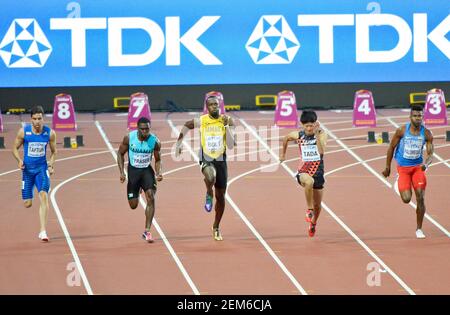 Usain Bolt (Giamaica), Warren Fraser (Bahamas), Shuhei Tada (Giappone). 100 metri uomini, serie di riscaldatori. IAAF Athletics World Championships - Londra 2017 Foto Stock