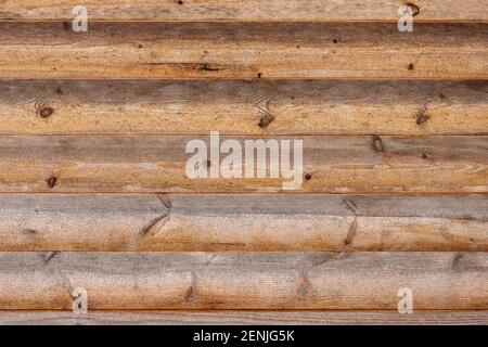 Parete di legno fatta di tronchi, trama foto di sfondo Foto Stock