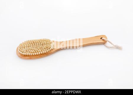 Una spazzola da bagno in legno Foto Stock