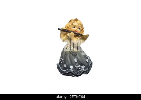 Statuetta di un angelo ragazza con un flauto isolato sopra uno sfondo bianco Foto Stock