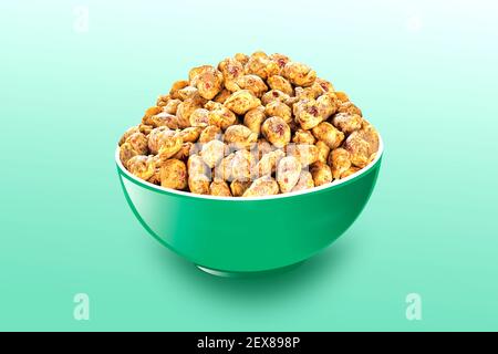 Masala o Bhujia spiccata o arachidi Bhujiya, è uno spuntino indiano molto popolare, Namkeen Green Bowl Foto Stock