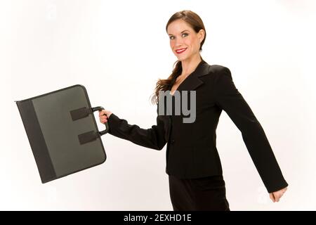 Donna attraente in Business Suit Azienda Portfolio Valigetta Foto Stock