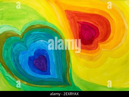 Immagine astratta con due cuori multicolore dipinti con acquerelli Foto Stock