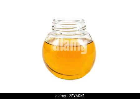 Olio vegetale in vaso di vetro isolato su fondo bianco Foto Stock