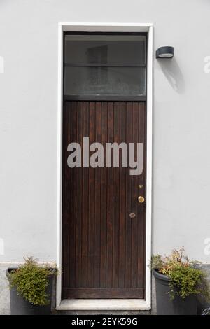 Antica casa di legno porta Monza Europa Foto Stock
