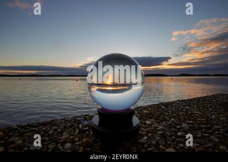 Tramonto sul fiume Deben a Ramsholt a Suffolk, Regno Unito Foto Stock