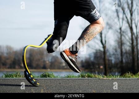 eseguire l'addestramento con protesi sportive Foto Stock