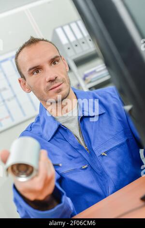 far sì che il lavoratore sia in ufficio Foto Stock