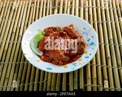 Africa occidentale di pollo piccante zuppa di arachidi Foto Stock