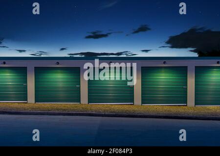 Vista creativa di porte verdi e luci incandescenti del deposito auto di notte, Stati Uniti Foto Stock