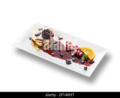 Pancake con sciroppo e bacche Foto Stock