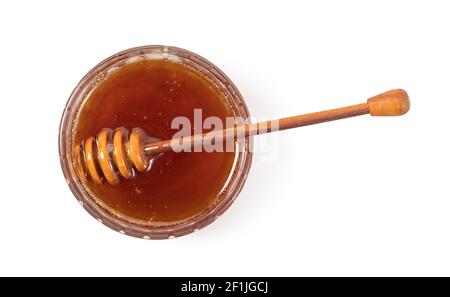 Miele in un vaso trasparente Foto Stock