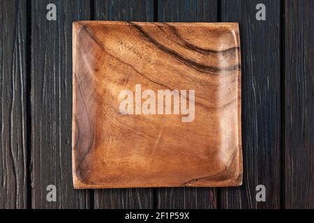 Bordo di taglio su una tavola di legno Foto Stock