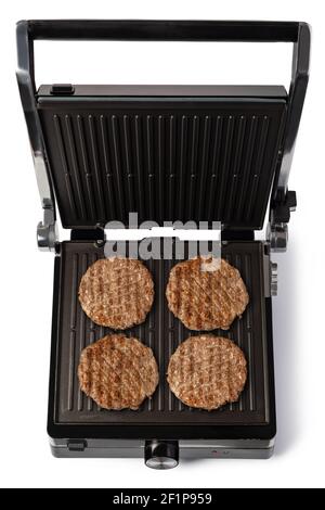 Carne di hamburger alla griglia elettrica Foto Stock