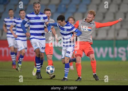 DOETINCHEM, NEDERLAND - 7 MARZO: Ralf Seuntjens di De Graafschap Mohamed Hamdaoui di De Graafschap Jort van der Sande del FC Eindhoven durante il Keuke Foto Stock