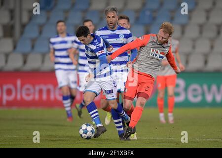 DOETINCHEM, NEDERLAND - 7 MARZO: Mohamed Hamdaoui di De Graafschap Ralf Seuntjens di De Graafschap Jort van der Sande del FC Eindhoven durante il Keuke Foto Stock