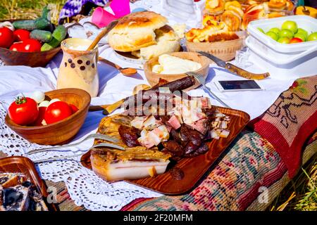 Pasto tradizionale, colazione in aperto al momento del raccolto. Foto Stock