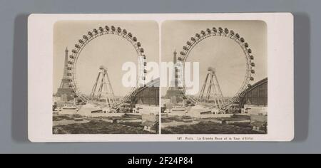 Vista della Roue de Paris e della Torre Eiffel a Parigi; Parigi. La Grande Roue et la Tour d'Eiffel .. Foto Stock