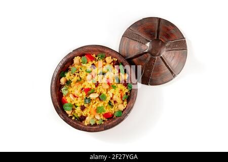 Couscous nella tagine tradizionale, top shot Foto Stock