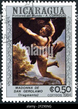 NICARAGUA - CIRCA 1984: Un francobollo stampato in Nicaragua, raffigurato il dipinto di Correggio - Ganymede rapito dall'Aquila, circa 1984 Foto Stock