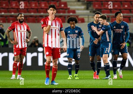 PIREO, GRECIA - MARZO 11: Squadra dell'Arsenale FC che celebra l'obiettivo di Martin Odegaard dell'Arsenale FC durante l'Olympiacos contro Arsenal - UEFA Europa League Foto Stock